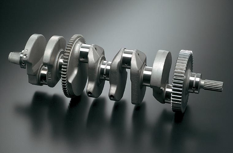 Vilebrequin de moteur bicylindre avec masses et engrenages